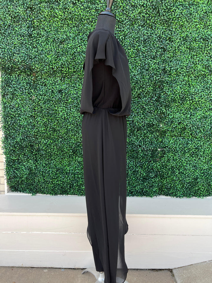 black flirty jumpsuit with chiffon overlay