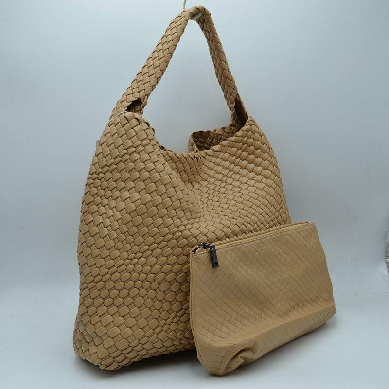 tres chic women's online boutique with large woven shoulder tote bag