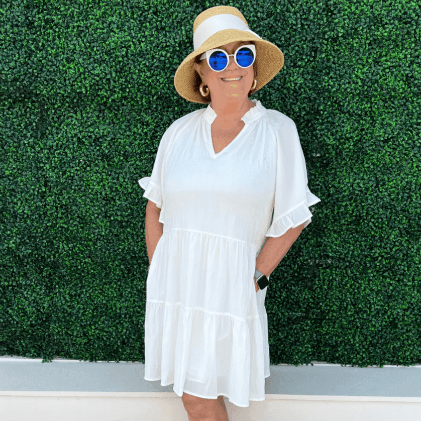Boutique owner Susan Hancock wearing this light weight summer dress from Tres Chic women's clothing store on Eastside street