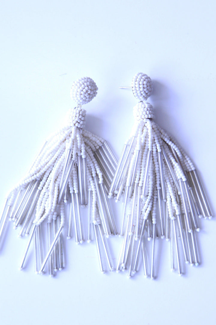 White beaded long statement earrings online and in store