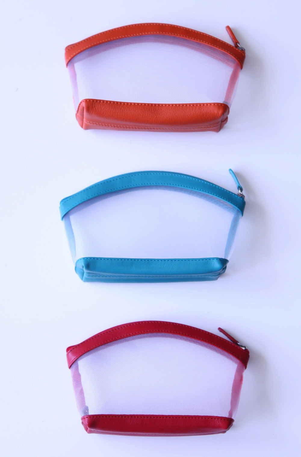 Light blue, red, and orange med pouches