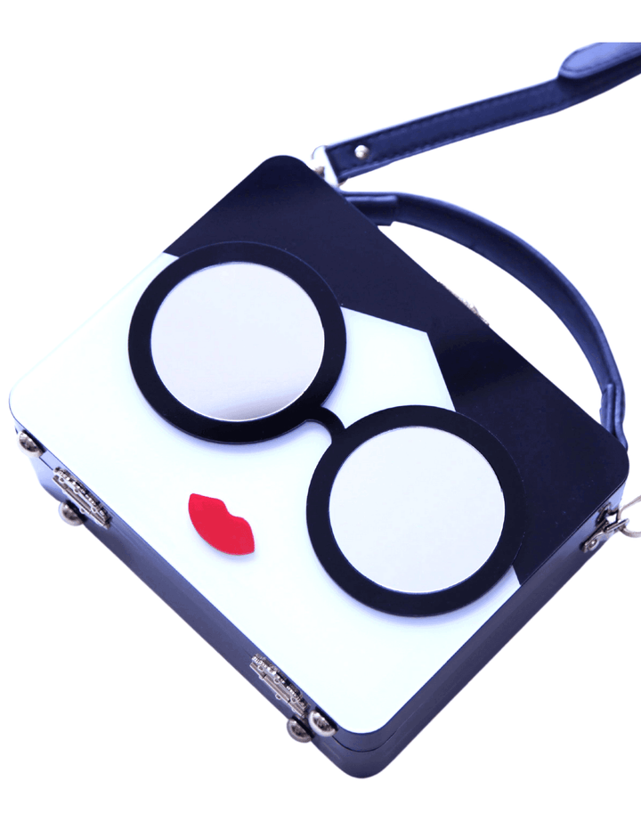Designer purse with face womens eyes and mouth with mirror in eyes black white and red