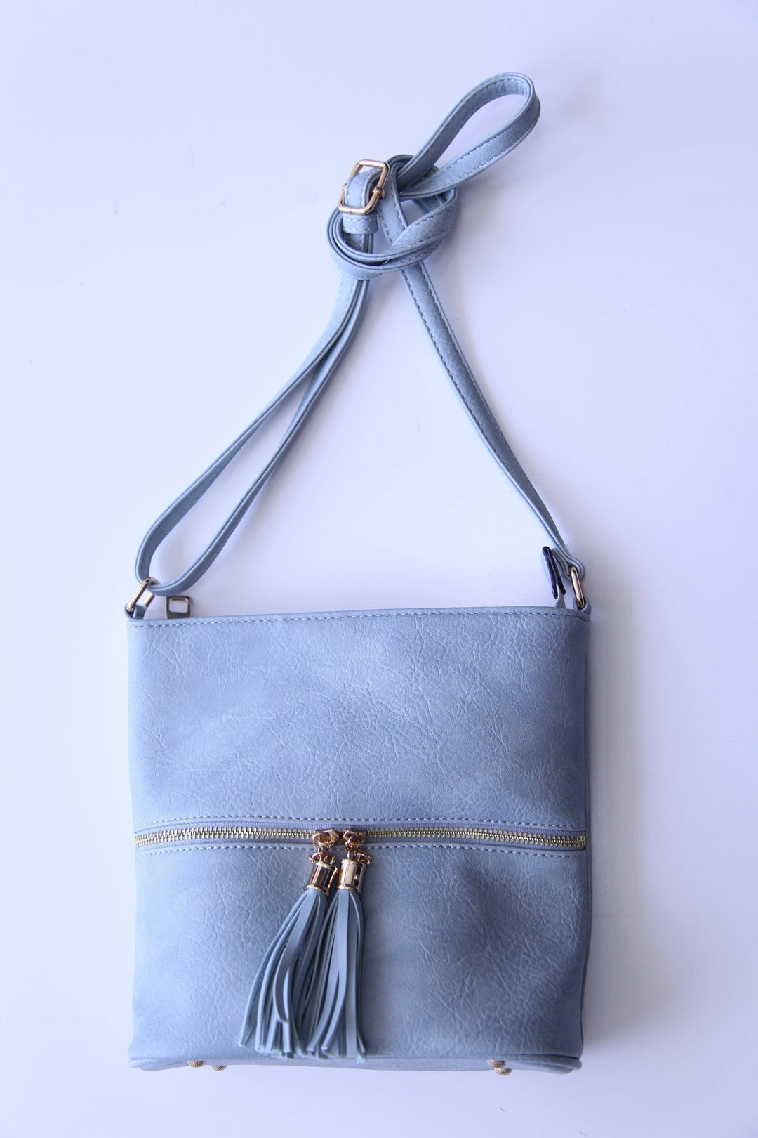 Dusty light blue crossbody purse from online women's boutique