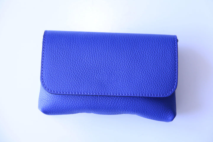 boutique with dresses royal blue purse