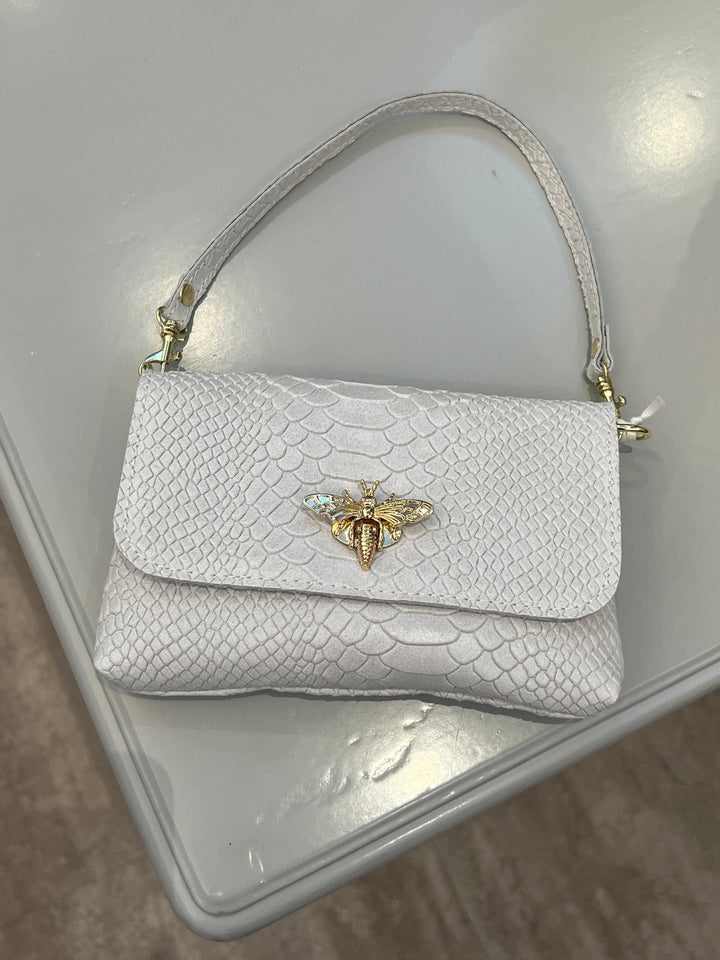 white leather bee clasp bag
