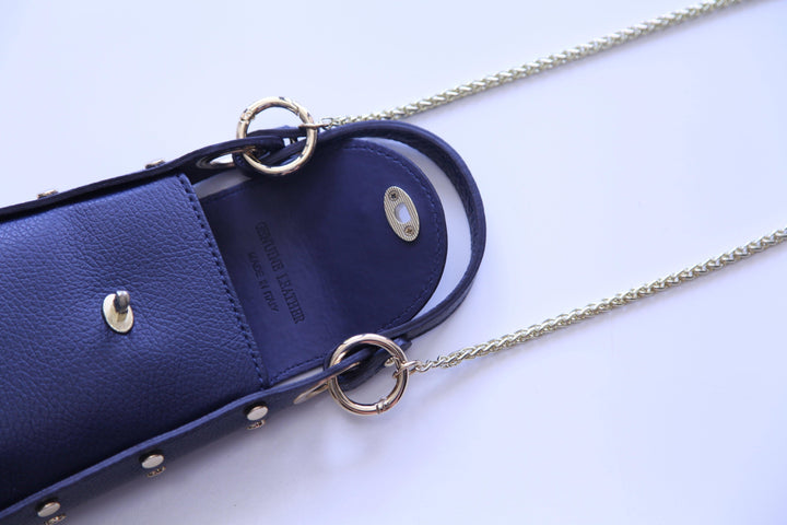 Inside and long gold chain strap of bee closure purse