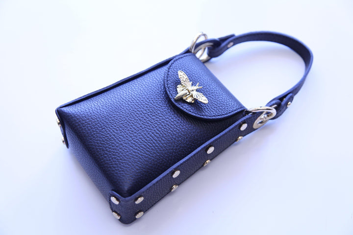 unique leather handbag with bee clasp closure