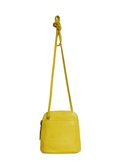 Lemon leather crossbody bag from online boutique Tres Chic