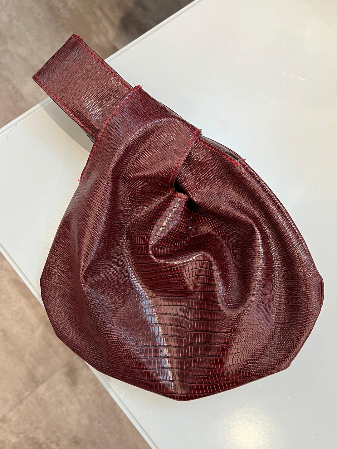 snakeskin leather wrist bag - tres chic
