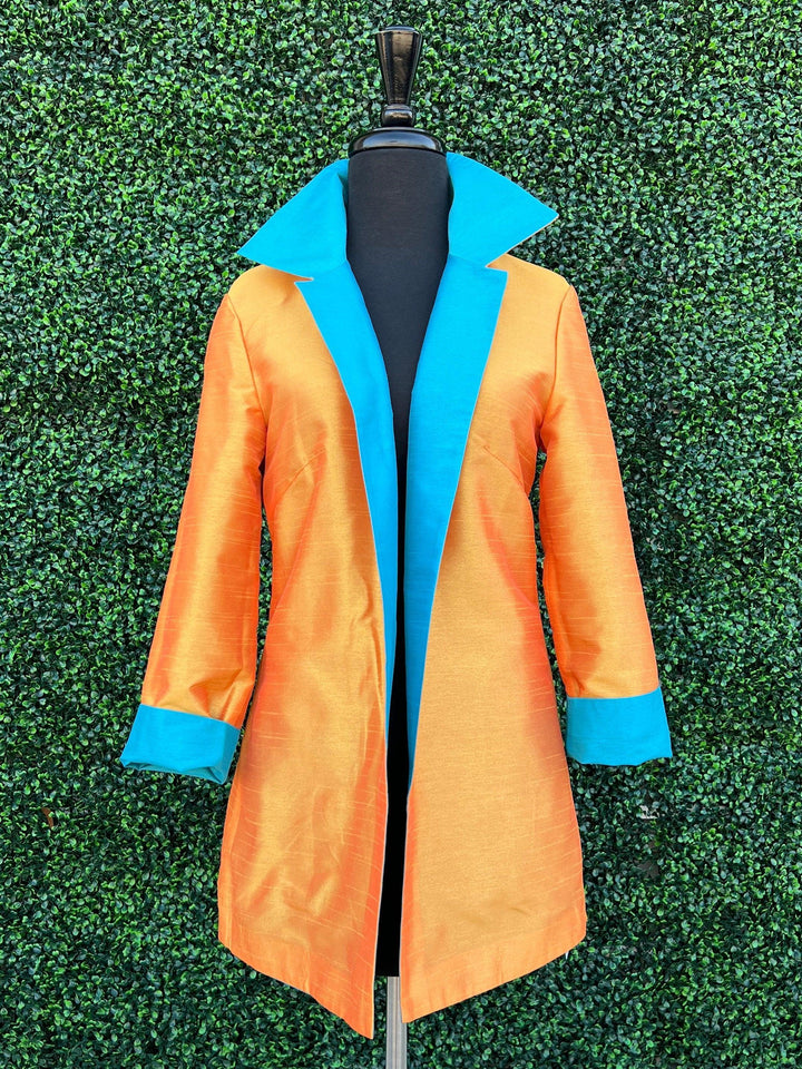 Grace Chuang reversible jacket orange and turquoise
