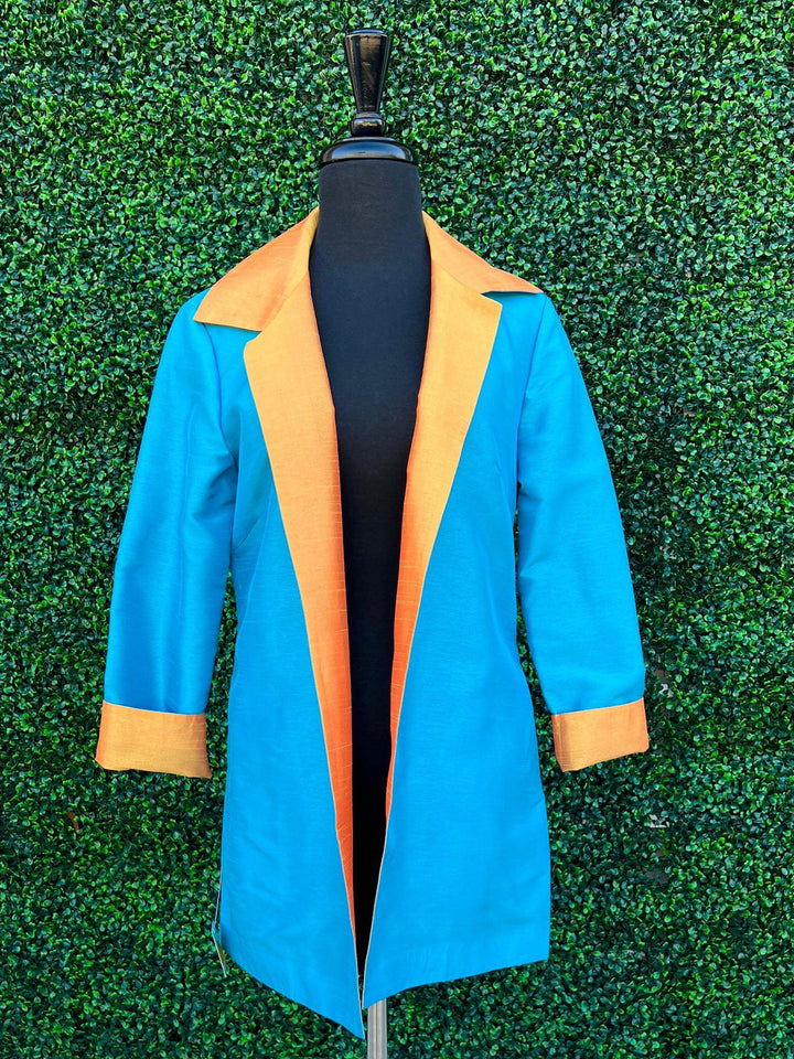 Grace Chuang reversible jacket orange and turquoise woman over 50