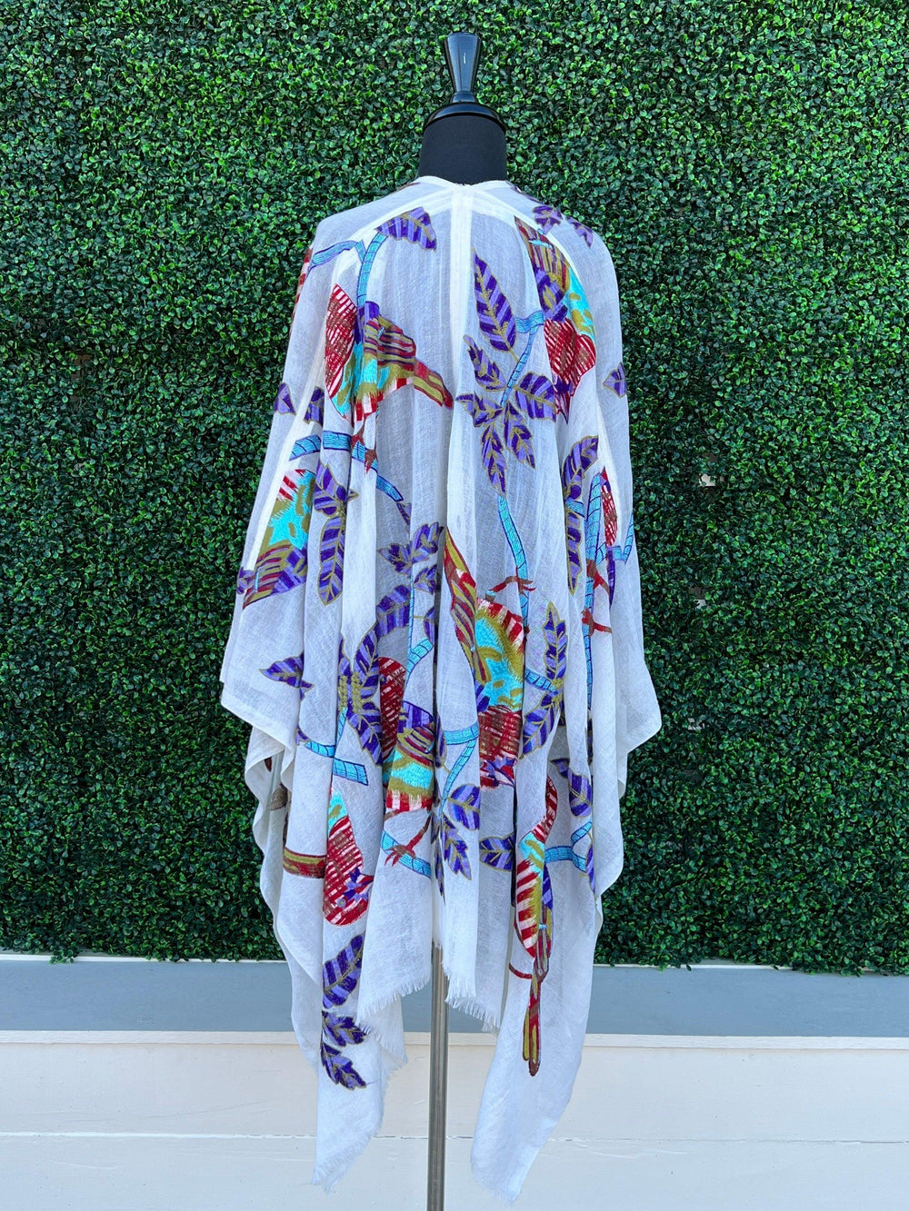 back of bird turquoise rodeo cape