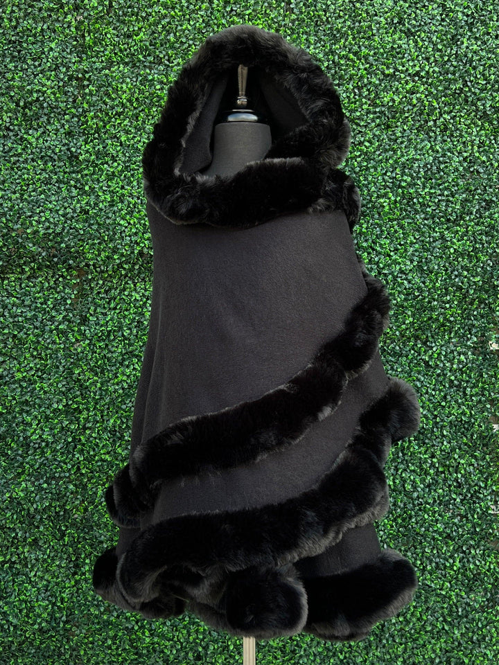 bee clasp handbag and black fur cape