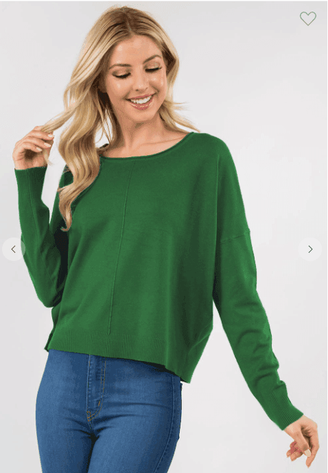 gift shop with super soft green sweater