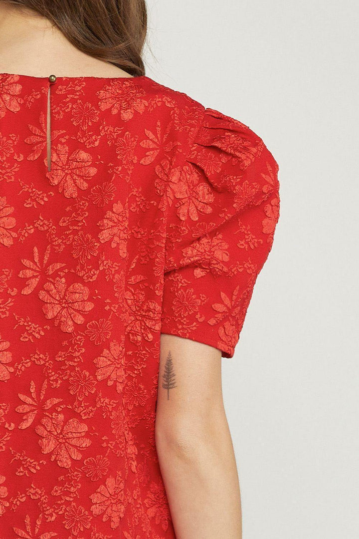 button keyhole closure red embossed blouse