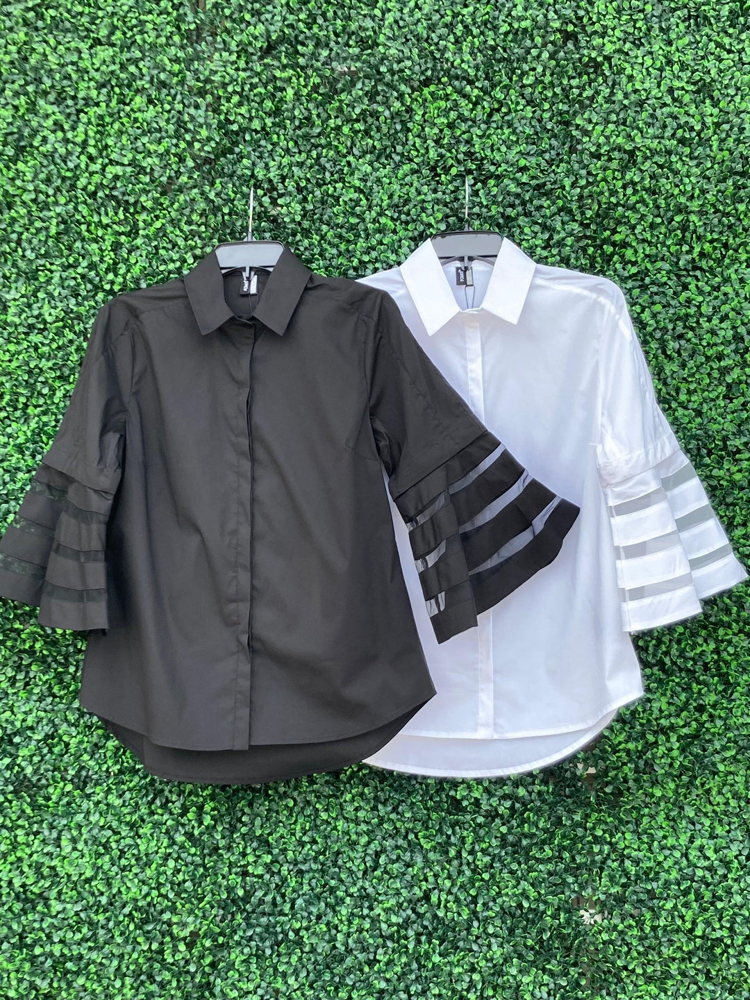 White and black bell sleeve tops with sheer panels