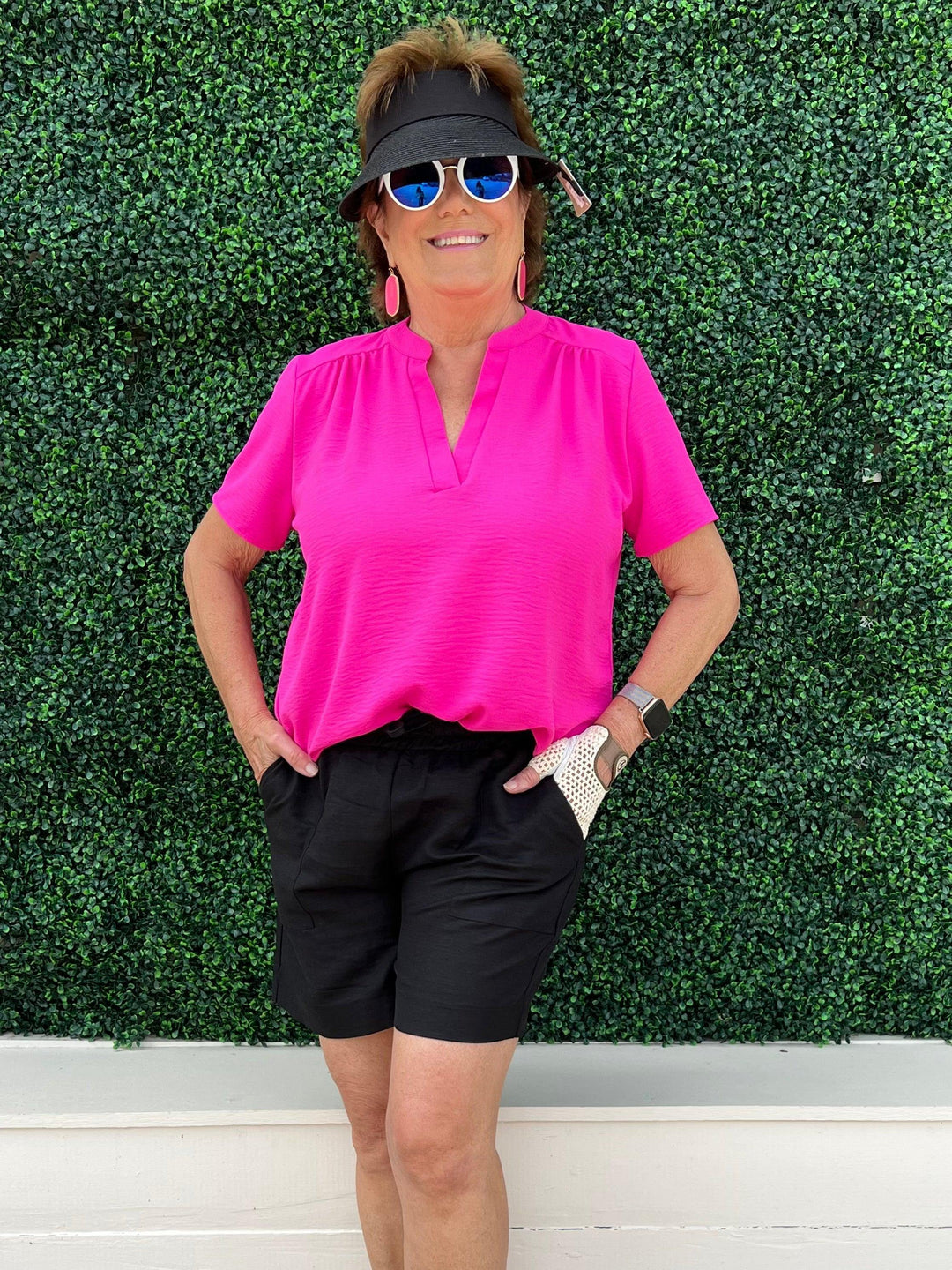 Boutique owner rocks these mid length shorts with her golf outfit