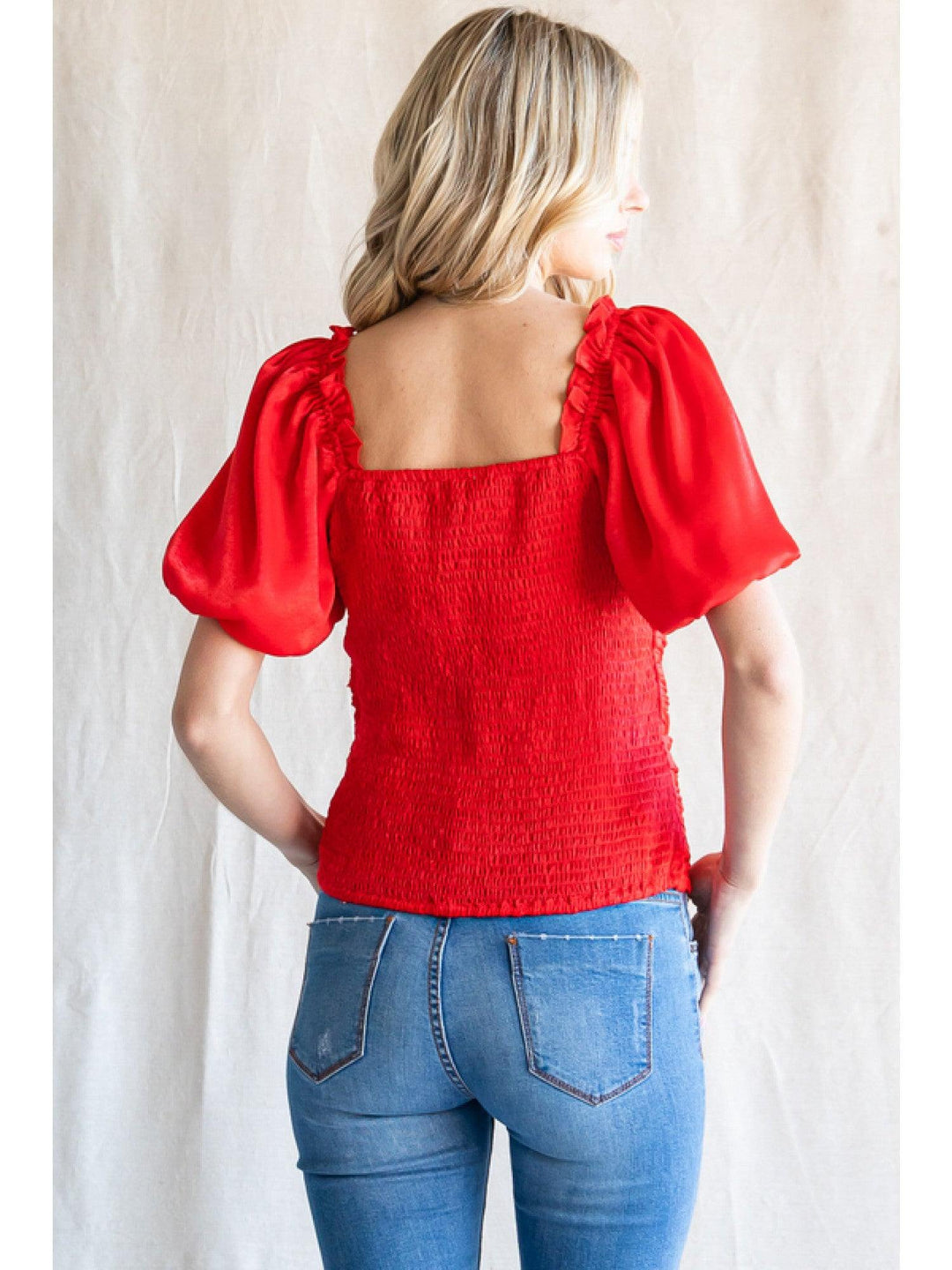 Solid red top with chest ruched, back smocked, frilled shoulder and short puffed sleeves jodifl