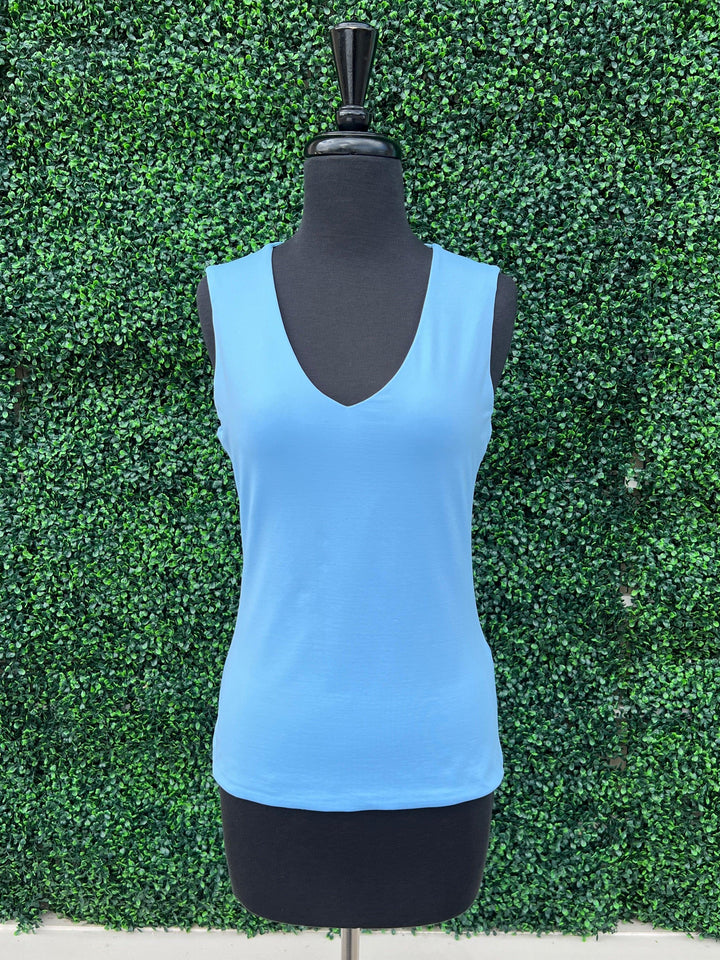 mannequin model wearing women's blue undershirt 