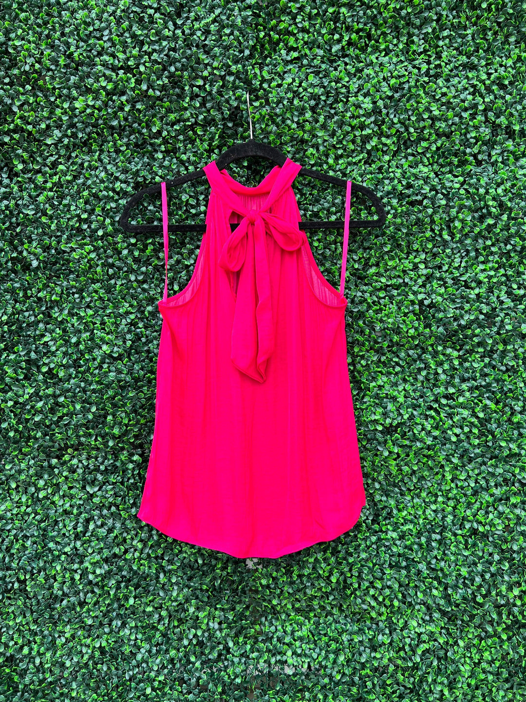 Tres Chic Dress Boutique on Houtson with silky tops can can be worn front and back in hot pink